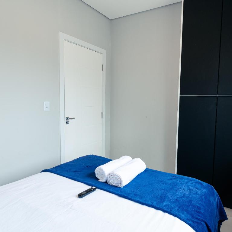Postel nebo postele na pokoji v ubytování M&M House - Casa com Piscina e Ar Condicionado em Matinhos