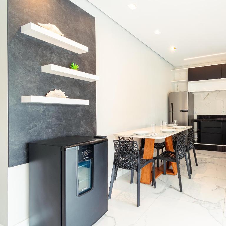 Kuchyň nebo kuchyňský kout v ubytování M&M House - Casa com Piscina e Ar Condicionado em Matinhos