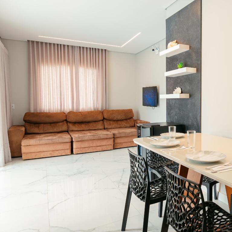 Posezení v ubytování M&M House - Casa com Piscina e Ar Condicionado em Matinhos