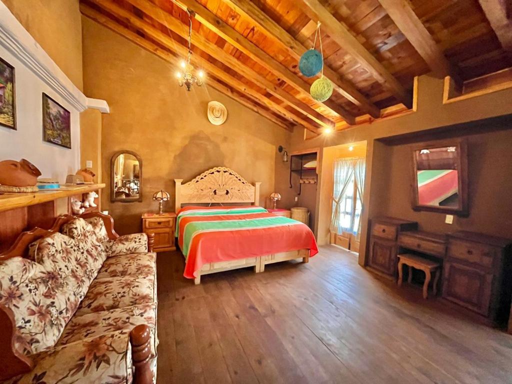 Postel nebo postele na pokoji v ubytování Casa del Sol