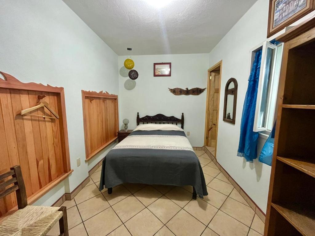Postel nebo postele na pokoji v ubytování Casa del Sol