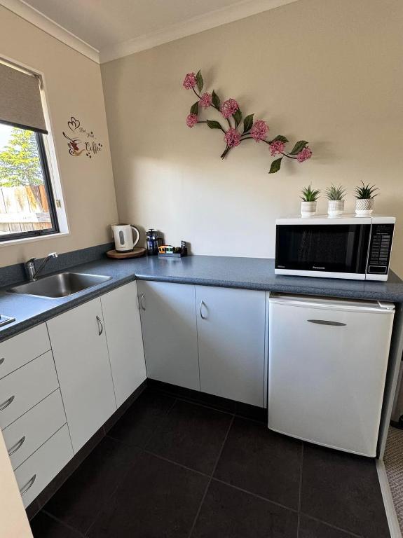 Centre Court Motel - Resim 26