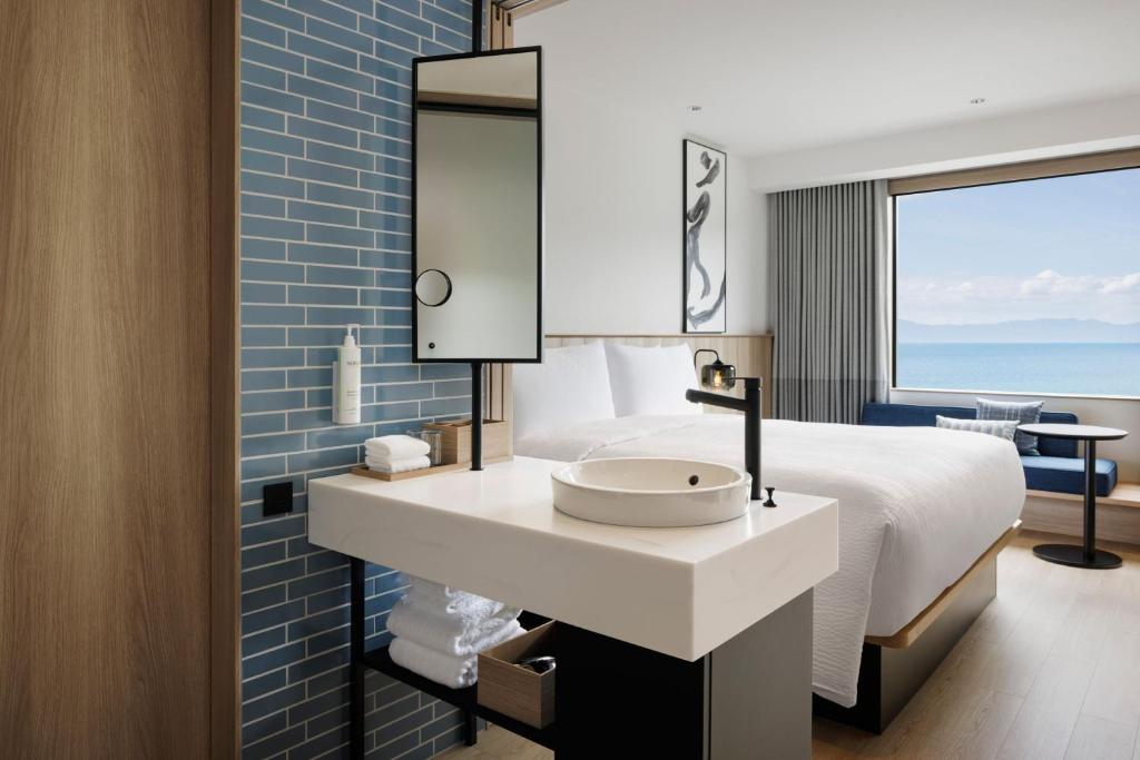 Fairfield by Marriott Kagoshima Sakurajimaにあるベッド