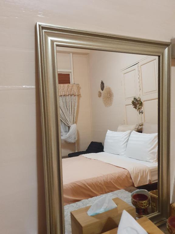 Postel nebo postele na pokoji v ubytování KINN Stay50 Bangkok