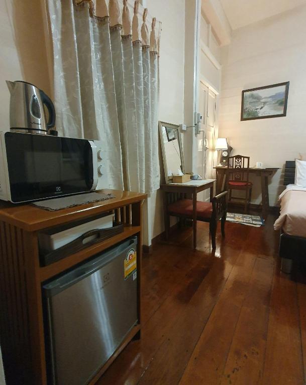 Kuchyň nebo kuchyňský kout v ubytování KINN Stay50 Bangkok