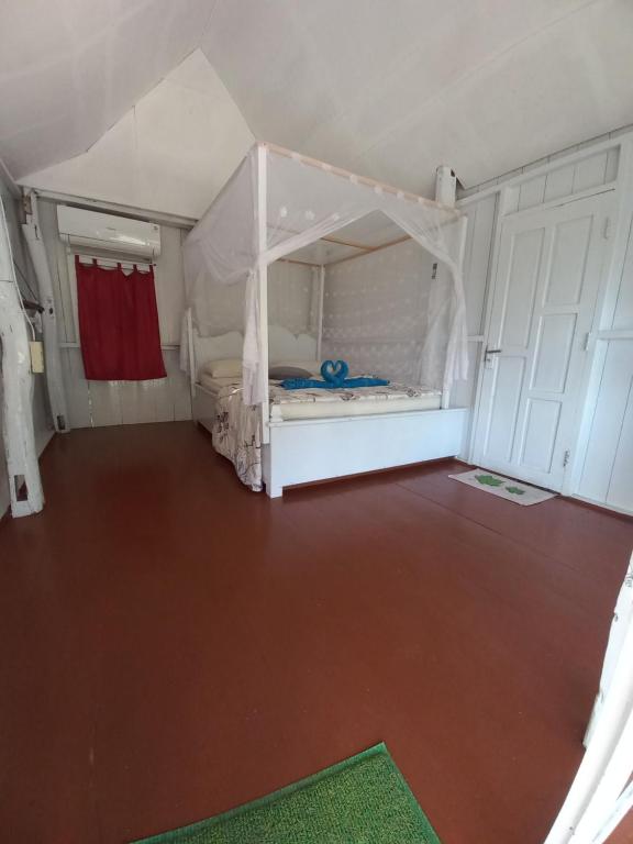 Postel nebo postele na pokoji v ubytování Scuba Republic Beach Bungalows