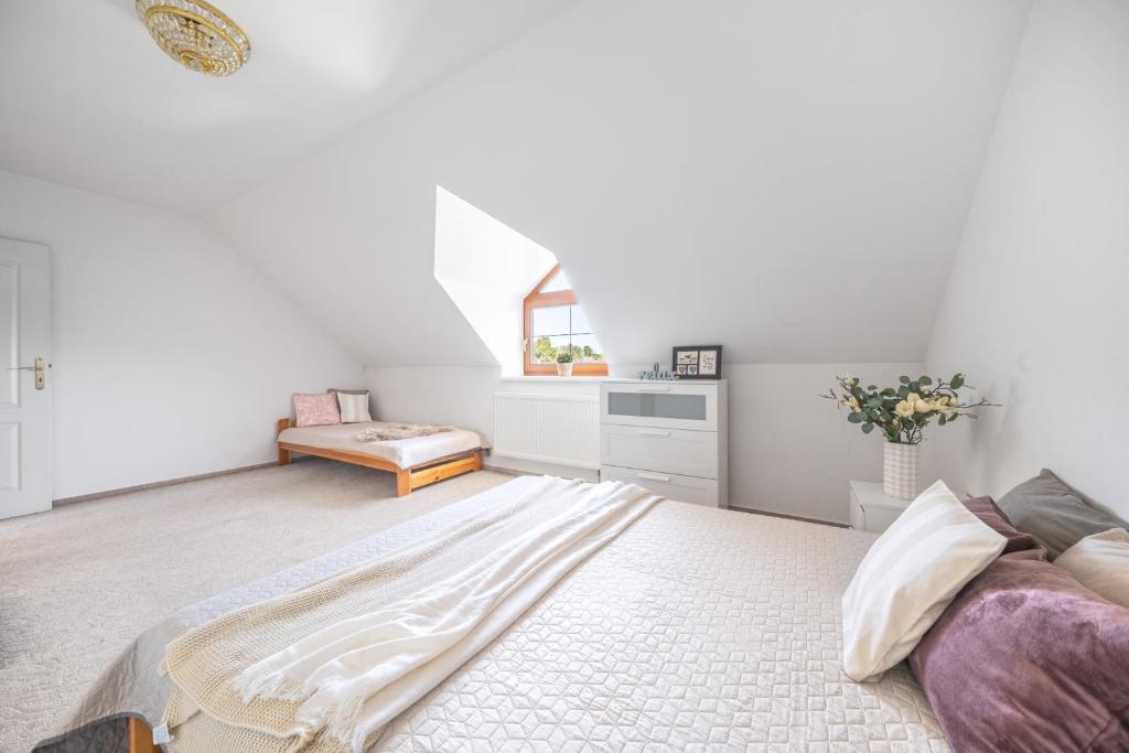 Postel nebo postele na pokoji v ubytování Holiday Home Smržovka