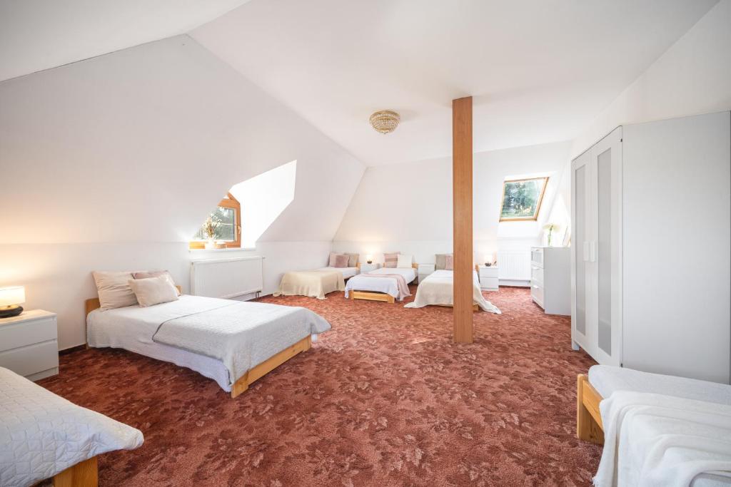 Postel nebo postele na pokoji v ubytování Holiday Home Smržovka