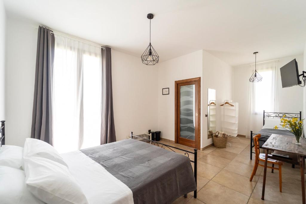 Postel nebo postele na pokoji v ubytování Casa Schiavoni