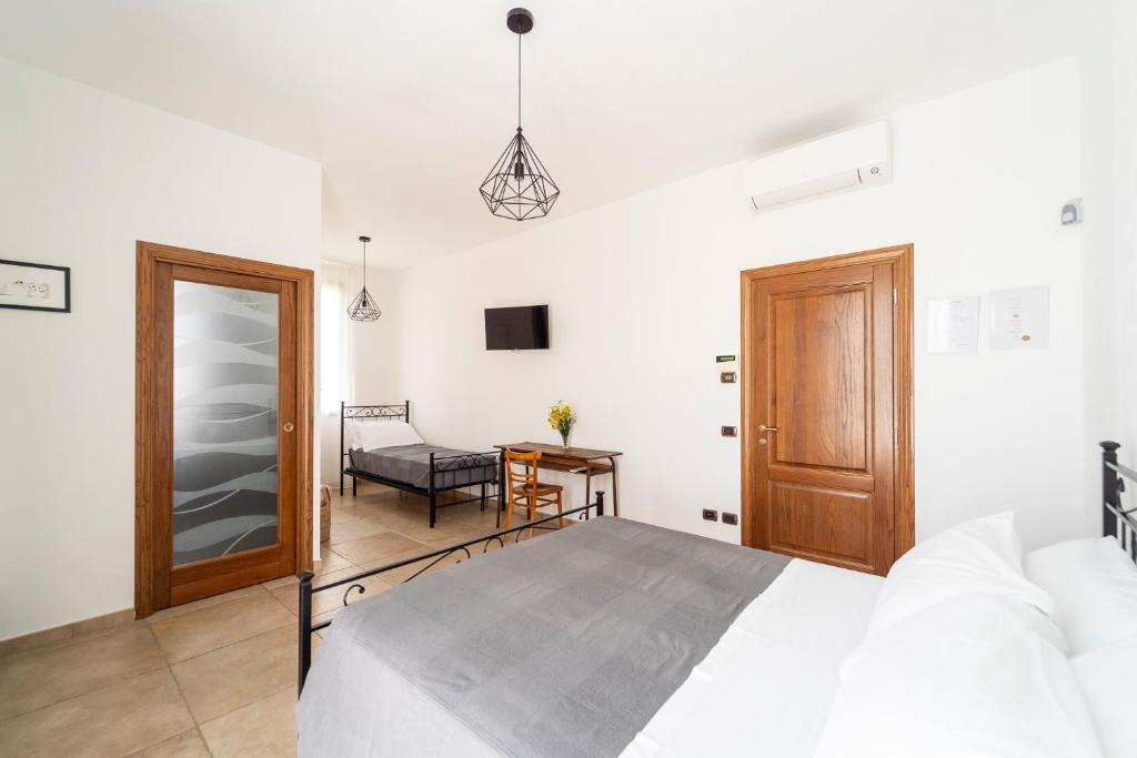 Postel nebo postele na pokoji v ubytování Casa Schiavoni