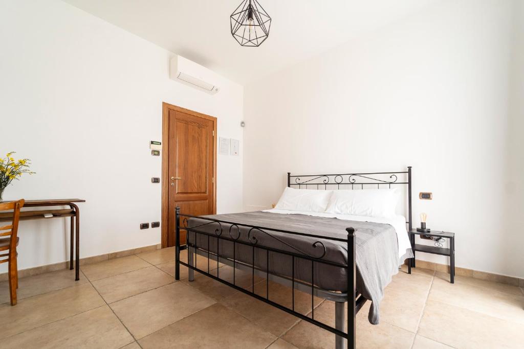 Postel nebo postele na pokoji v ubytování Casa Schiavoni