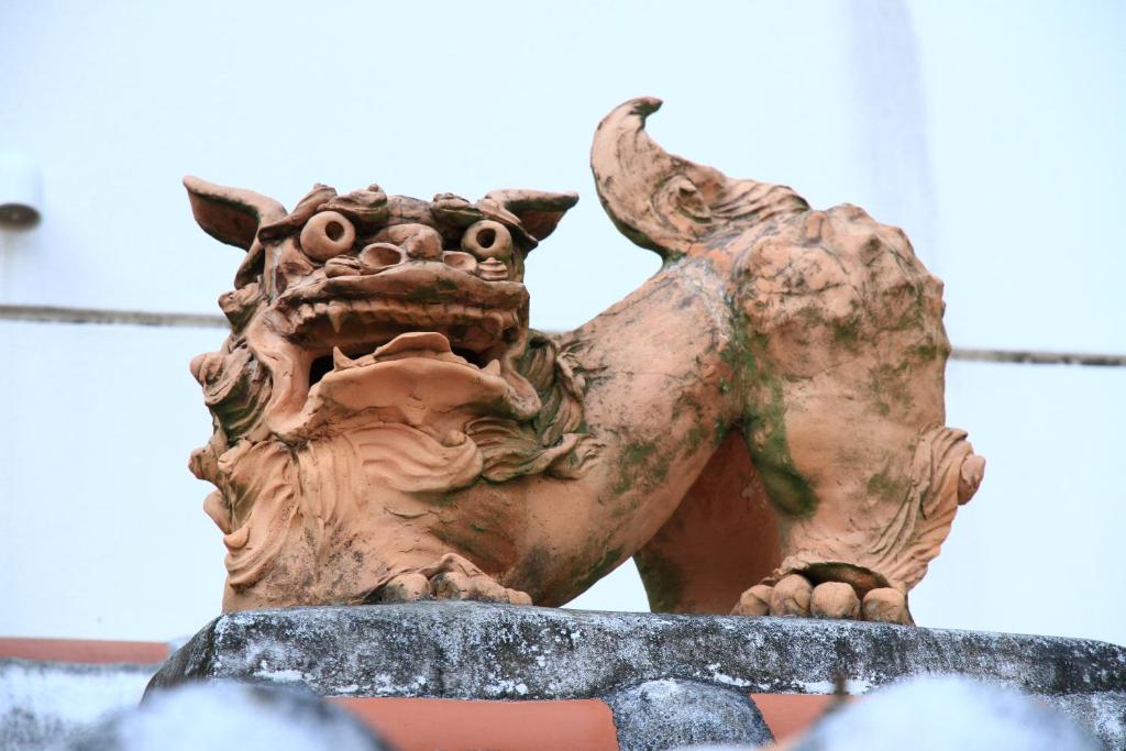 a statue of a dragon on top of a building at Joya in Ishigaki Island
