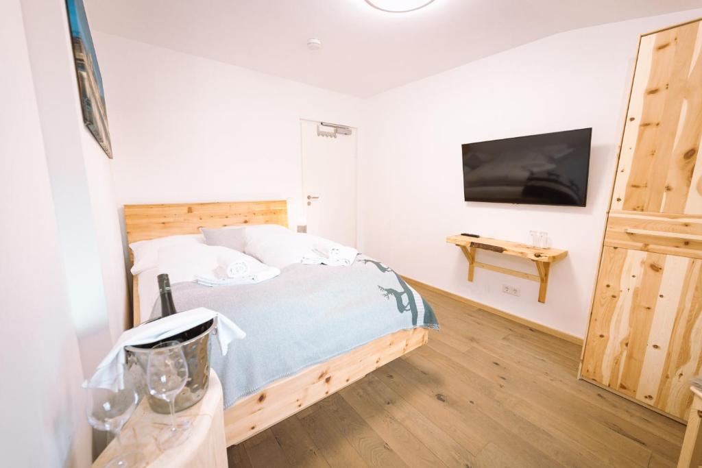 TV a/nebo společenská místnost v ubytování Landgasthof Rechenwirt