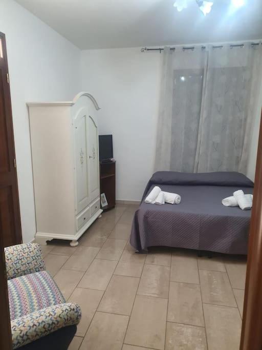 Postel nebo postele na pokoji v ubytování Casaimamà Viola