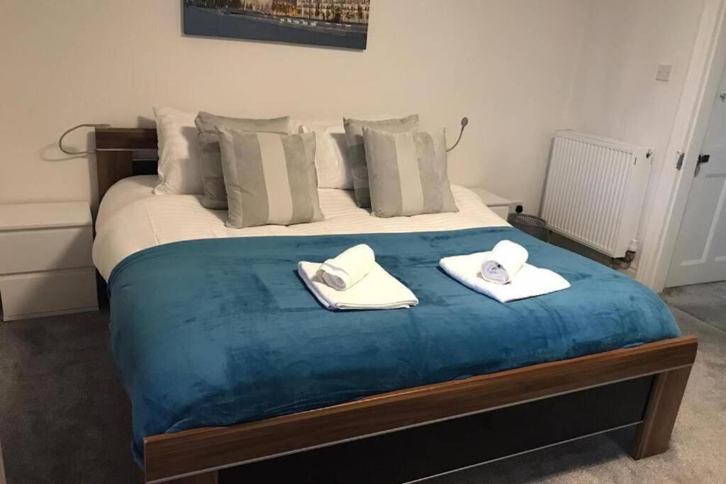 En eller flere senge i et værelse på The Windmill