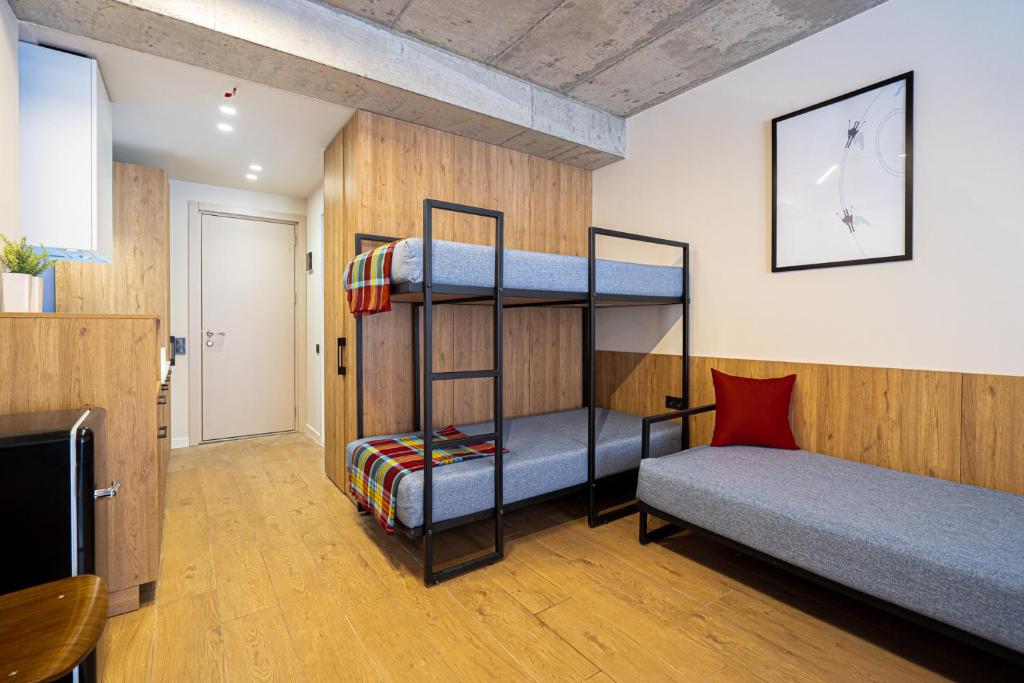 Postel nebo postele na pokoji v ubytování Gudauri ski apart room
