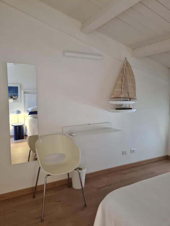 Postel nebo postele na pokoji v ubytování La Casa del Moro Pachino