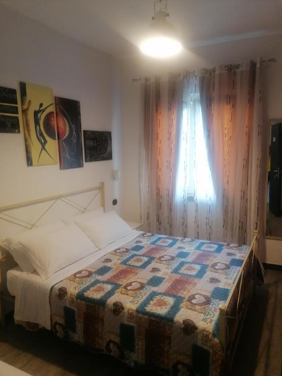 Postel nebo postele na pokoji v ubytování B&B "LA GIANCARLA"