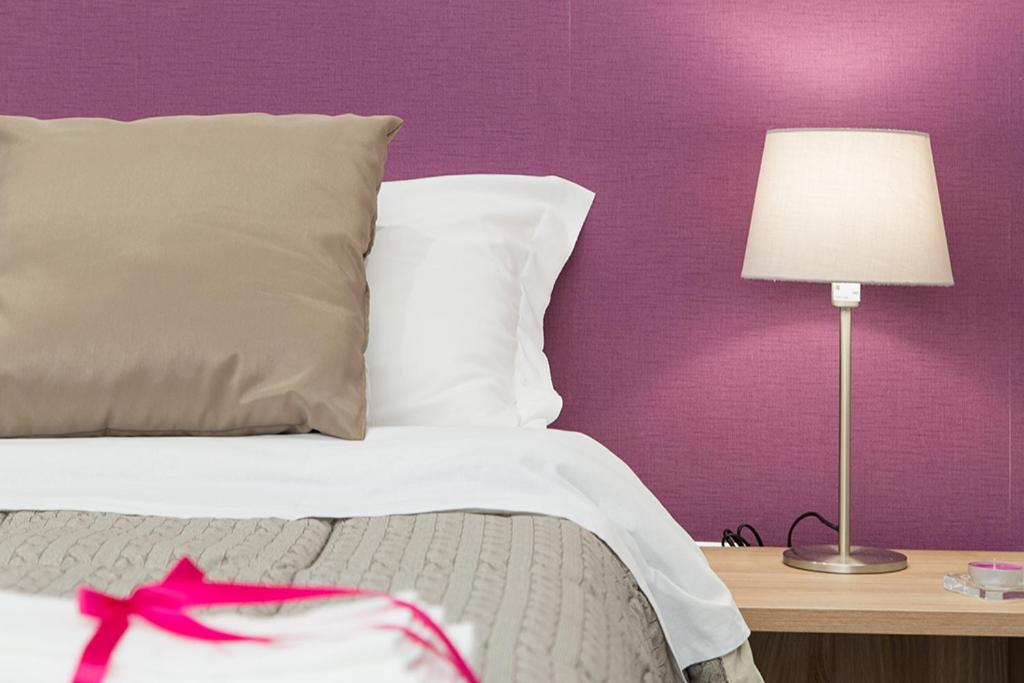 Letto o letti in una camera di l'angolo di Frima