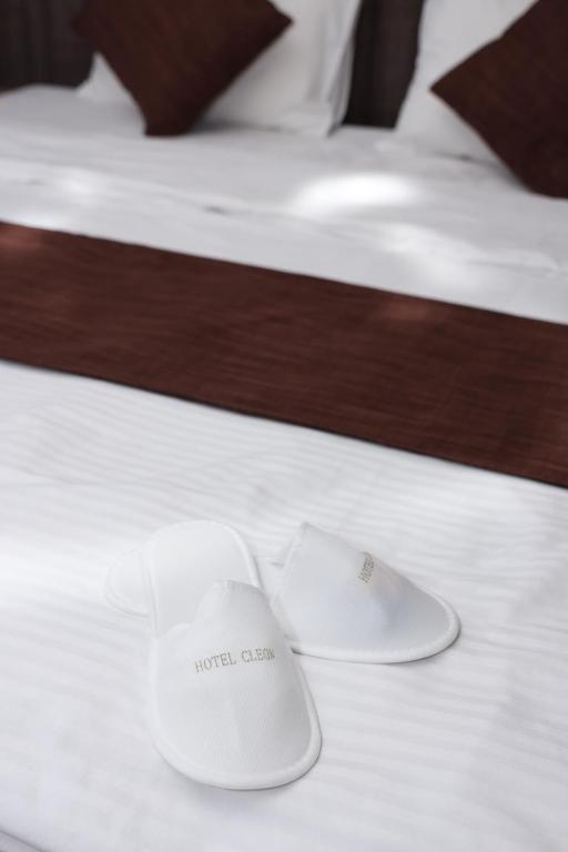 Postel nebo postele na pokoji v ubytování Hotel Cleon