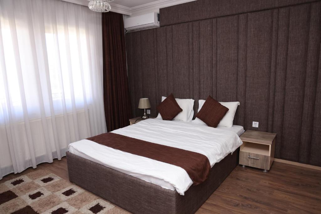 Postel nebo postele na pokoji v ubytování Hotel Cleon