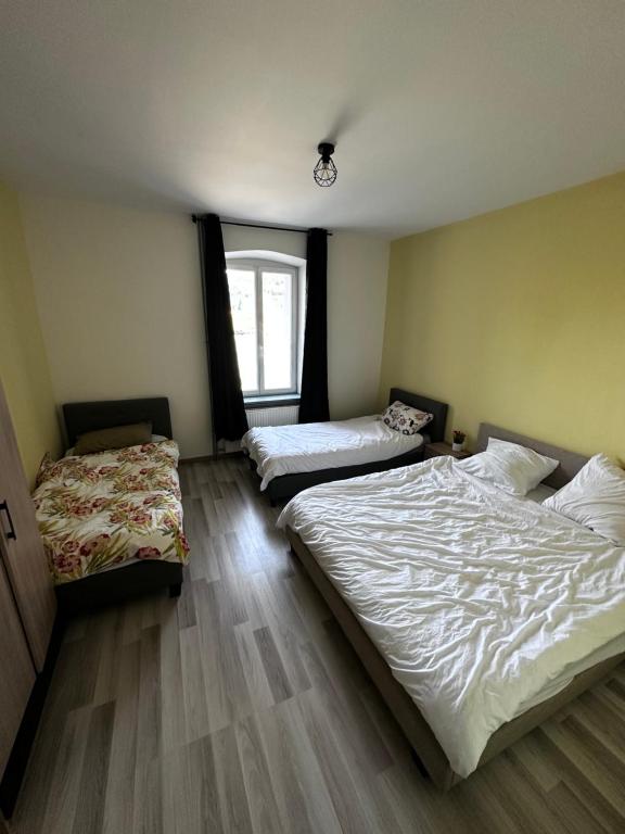 Postel nebo postele na pokoji v ubytování CAN appart spacieux avec grand jardin et terrasse 1 à 8 pers