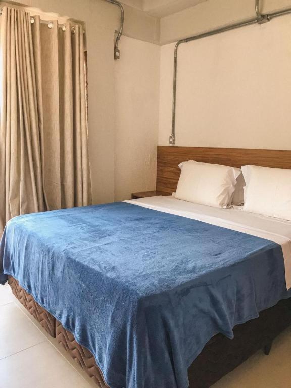 Voodi või voodid majutusasutuse Apartamento com garagem no Centro de Guaramiranga toas