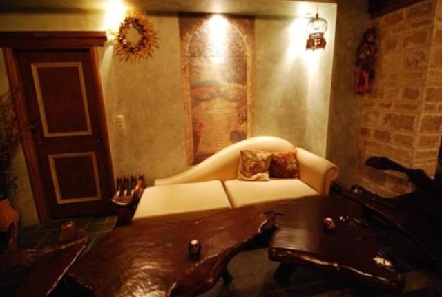 Postel nebo postele na pokoji v ubytování Lithos