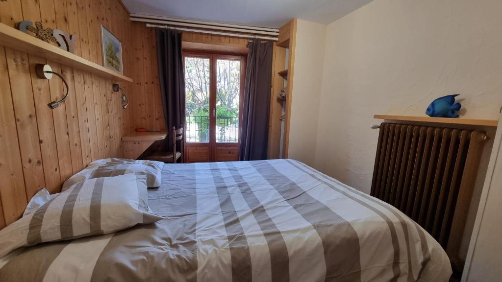 Postel nebo postele na pokoji v ubytování gite auberge l'herbe tendre