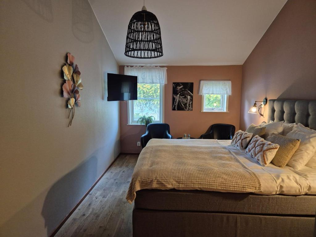 Postel nebo postele na pokoji v ubytování Hotel Fritza