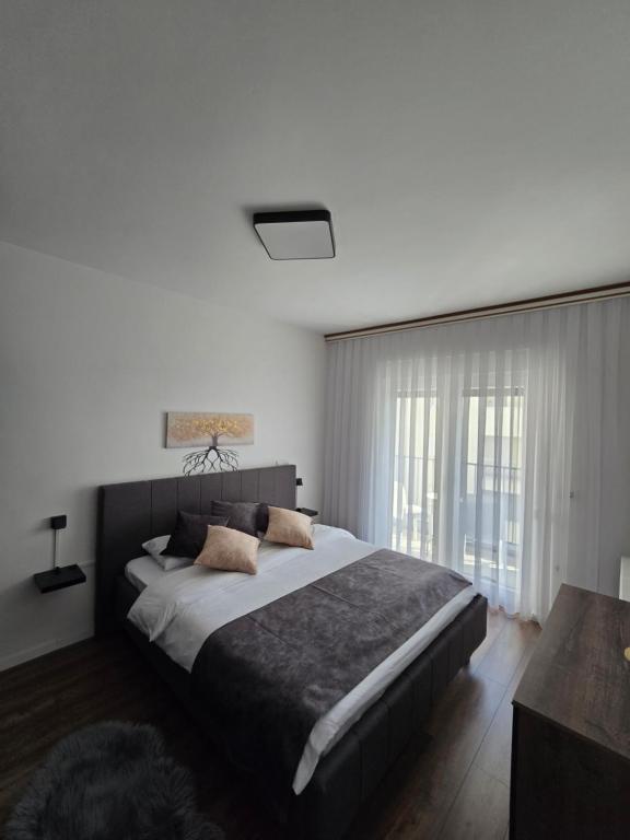 Gulta vai gultas numurā naktsmītnē REGEX Apartment