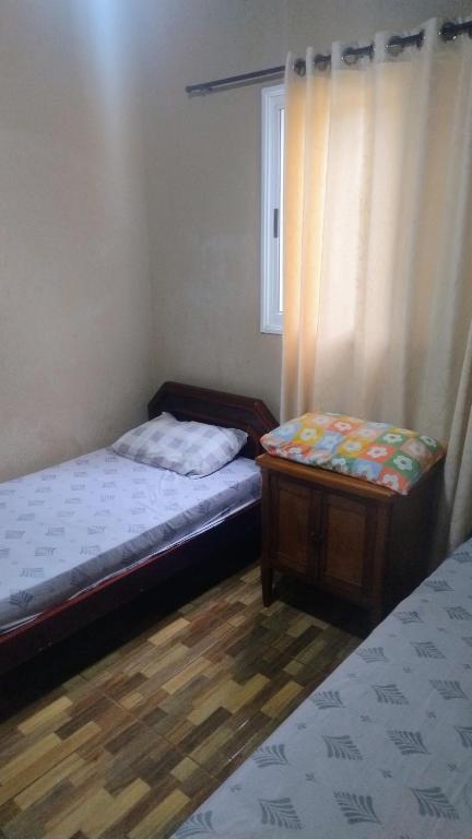 Postel nebo postele na pokoji v ubytování Alanna temporada