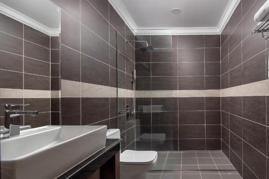 Koupelna v ubytování HM Grand Central Hotel