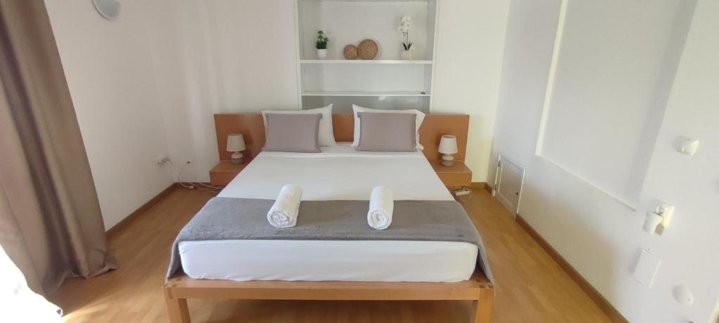 Postel nebo postele na pokoji v ubytování Casa TIANA