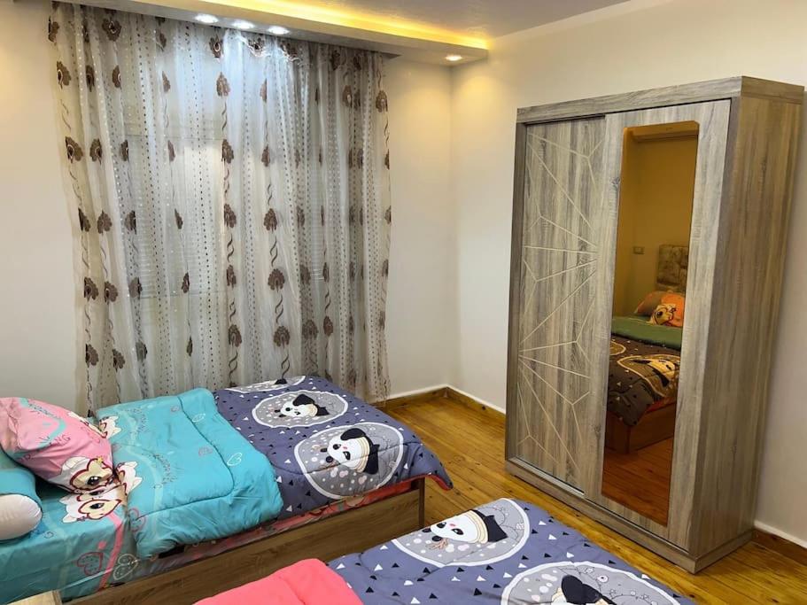 Postel nebo postele na pokoji v ubytování Three bedrooms apartment for Stars near city stars