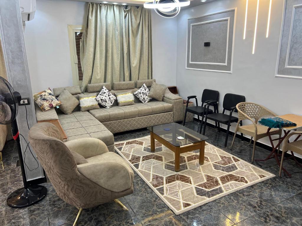 Posezení v ubytování Three bedrooms apartment for Stars near city stars