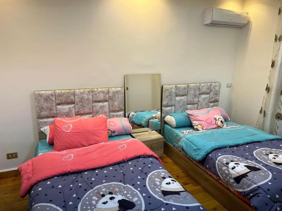 Postel nebo postele na pokoji v ubytování Three bedrooms apartment for Stars near city stars
