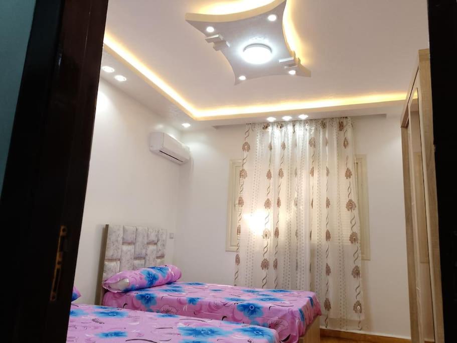 Postel nebo postele na pokoji v ubytování Three bedrooms apartment for Stars near city stars