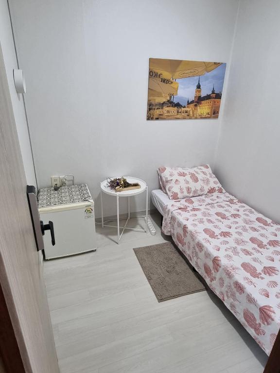 Postel nebo postele na pokoji v ubytování Tanhyun Rodeo Suite Livingtel