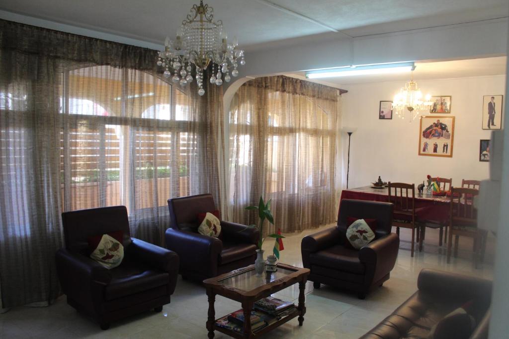 Posezení v ubytování Souillac-Guest House