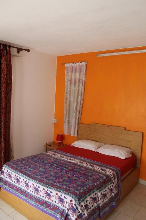 Postel nebo postele na pokoji v ubytování Souillac-Guest House