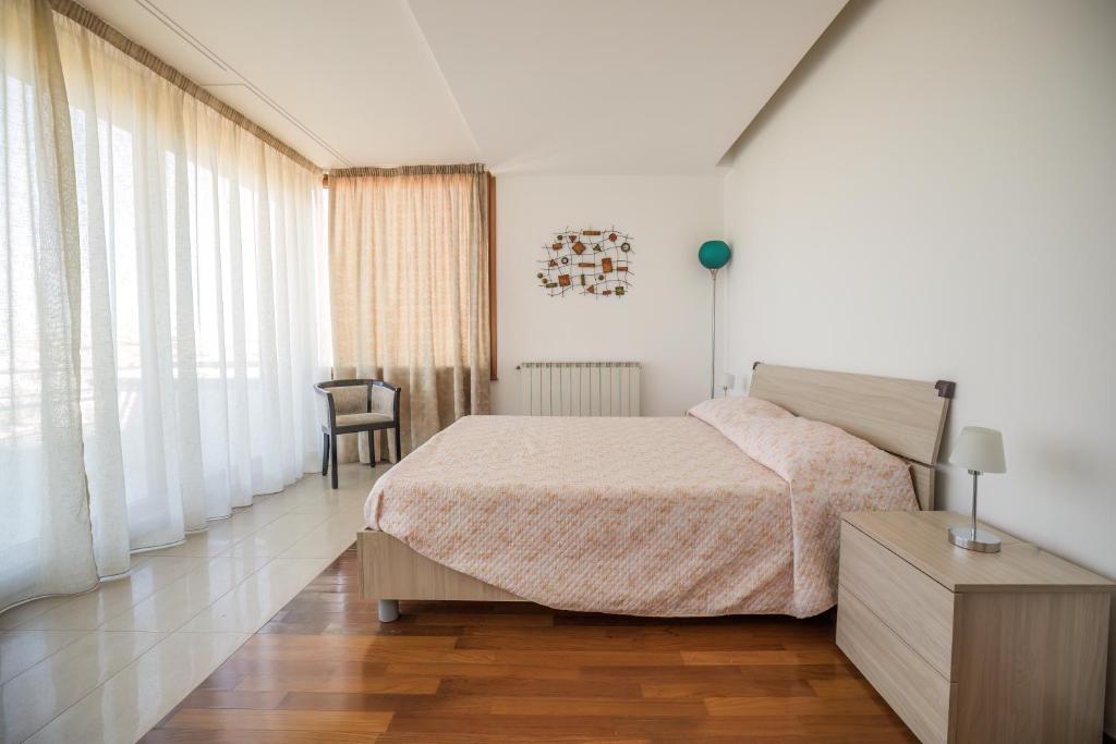 Postel nebo postele na pokoji v ubytování Sole Mare