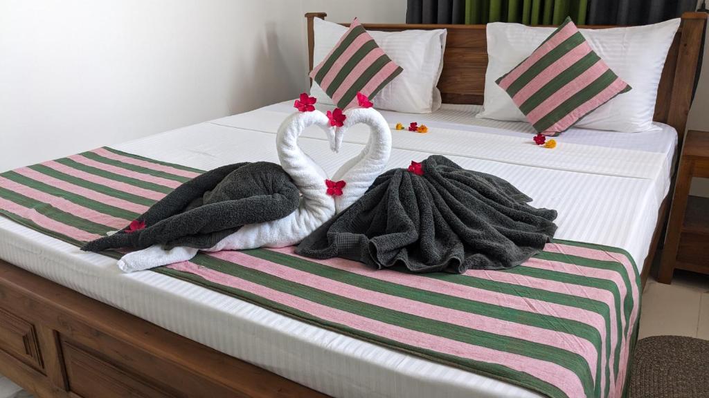 Postel nebo postele na pokoji v ubytování Star Beach Villa