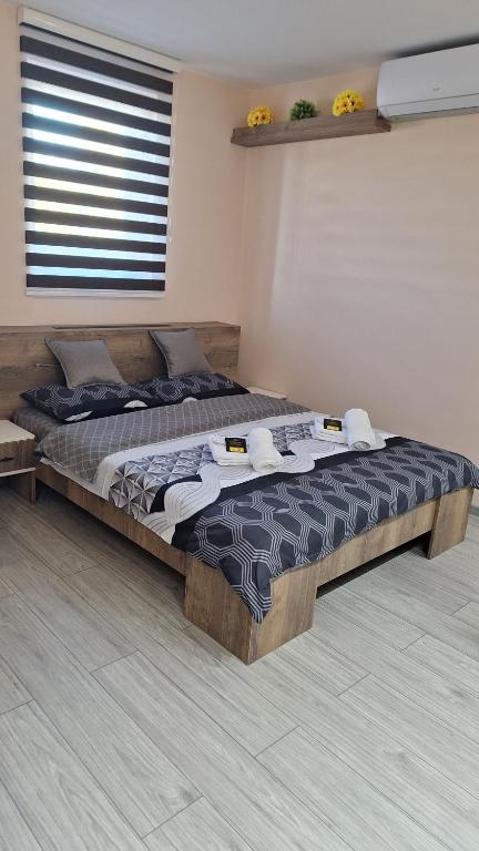 Postel nebo postele na pokoji v ubytování Apartments Green Beograd