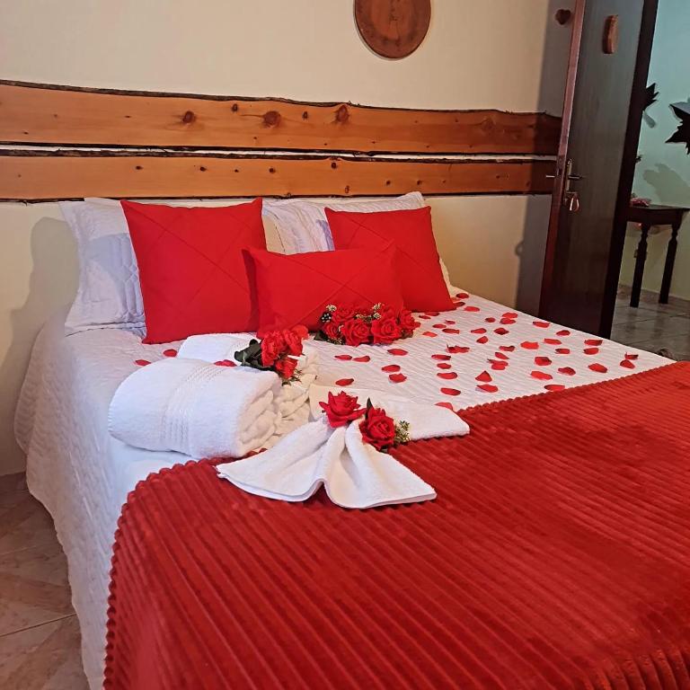 Uma cama ou camas num quarto em Pousada Valle do Sol