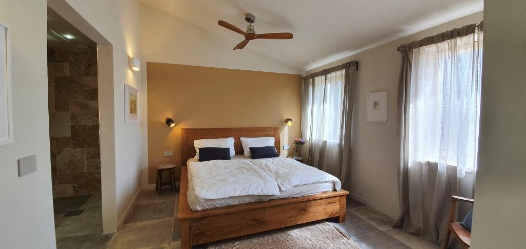 Postel nebo postele na pokoji v ubytování Lemonvilla - Rustico in Panoramalage