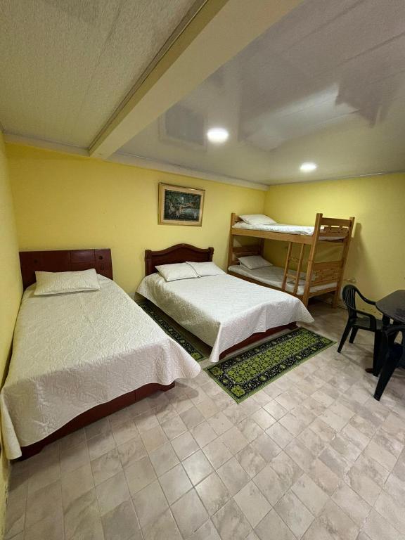Cama o camas de una habitación en El Peregrino