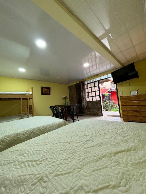 Cama o camas de una habitación en El Peregrino