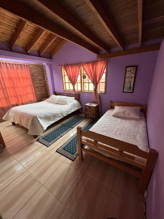 Cama o camas de una habitación en El Peregrino