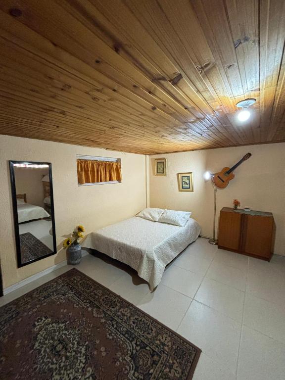 Cama o camas de una habitación en El Peregrino